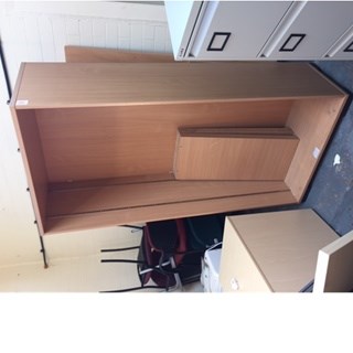 Tall wooden shelving unit