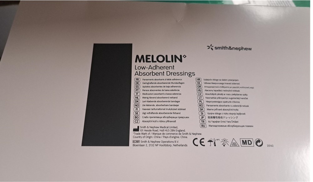 Low-Adherent Absorbent Dressings