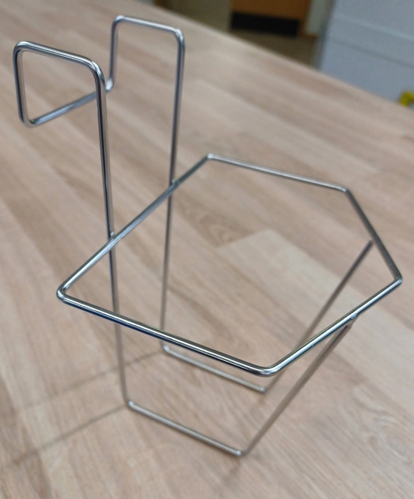 Hand sanitiser holder for bed