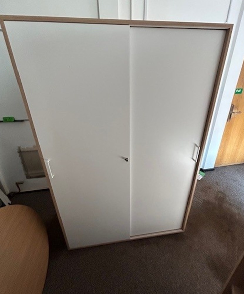 Bookcase with sliding doors