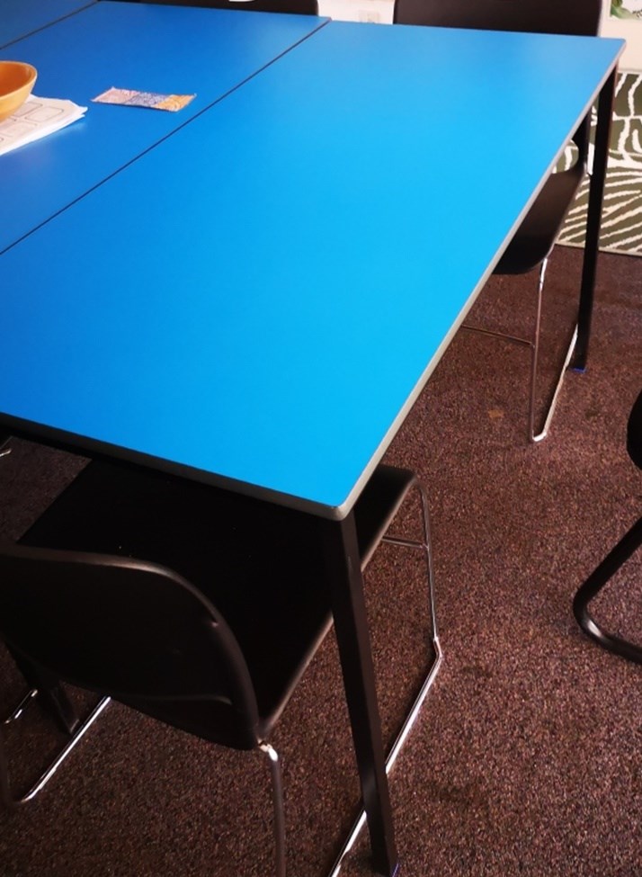 Blue topped Table with Black Legs