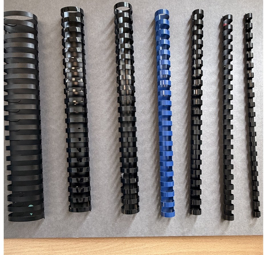 Plastic binding comb