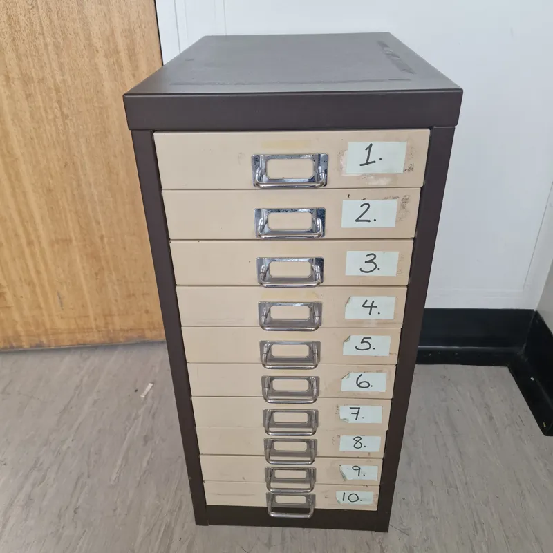 10-Drawer Storage Cabinet with Cream Drawers and Metal Handles
