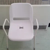 White Plastic Stacking Chair with Arms