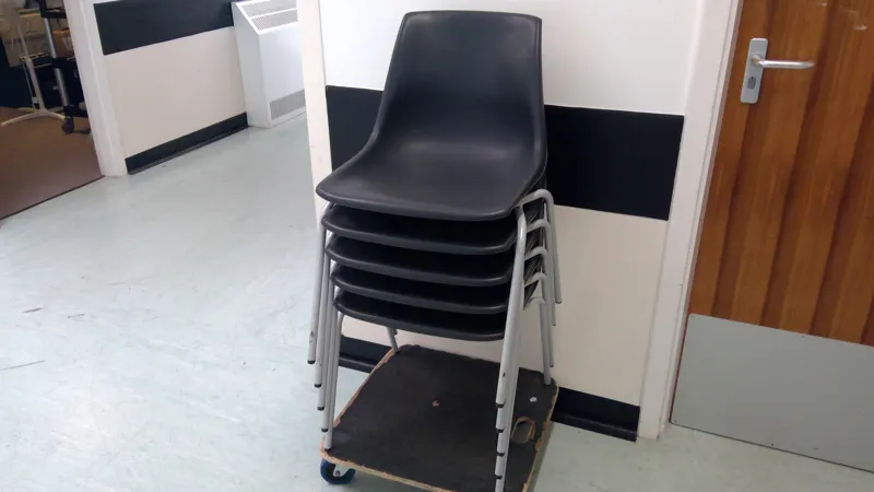 5 x Stacking Chairs with White Metal Frame - Black Seats