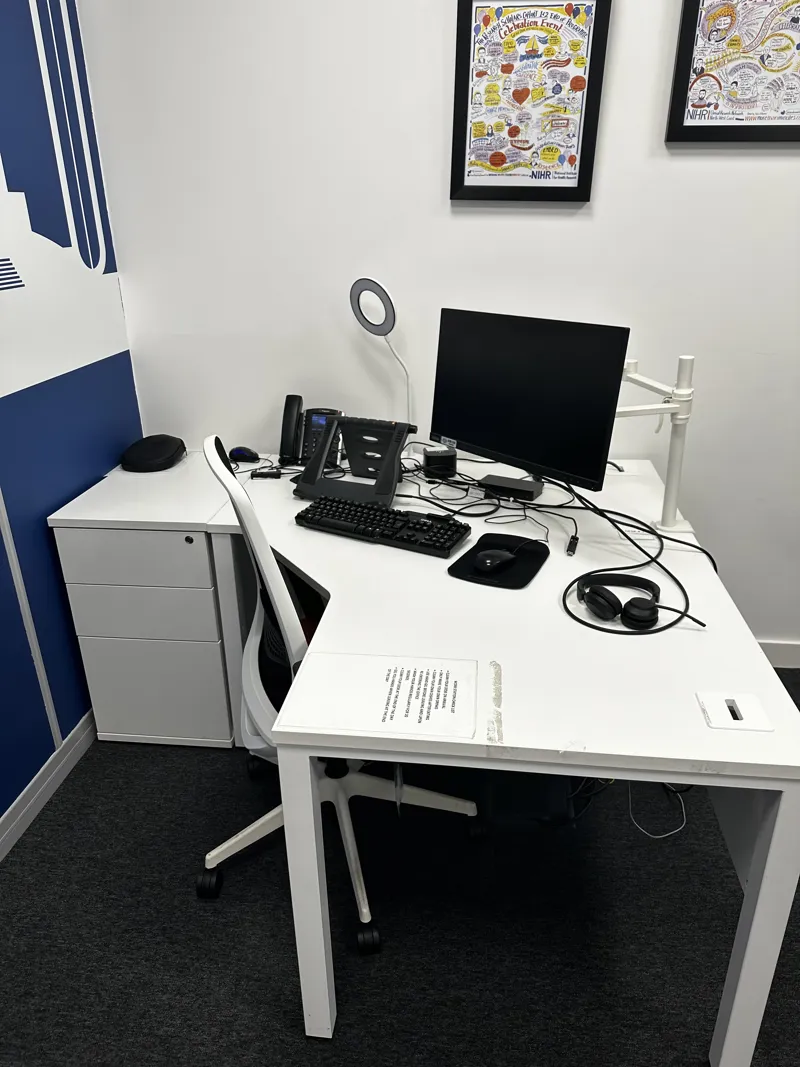 Corner office desk with chair and with meeting room table and 4 chairs