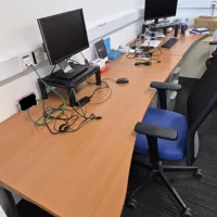 2 x symmetrical curved large wood office desks
