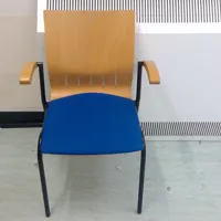 Wooden Stacking Chair with Blue Seat Pad and Armrests