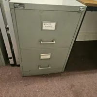 2 drawer filing cabinet with key, grey, top surface corroded.