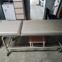 Medical examination couch with headrest and footrest