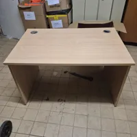 Light wood office desk with cable management